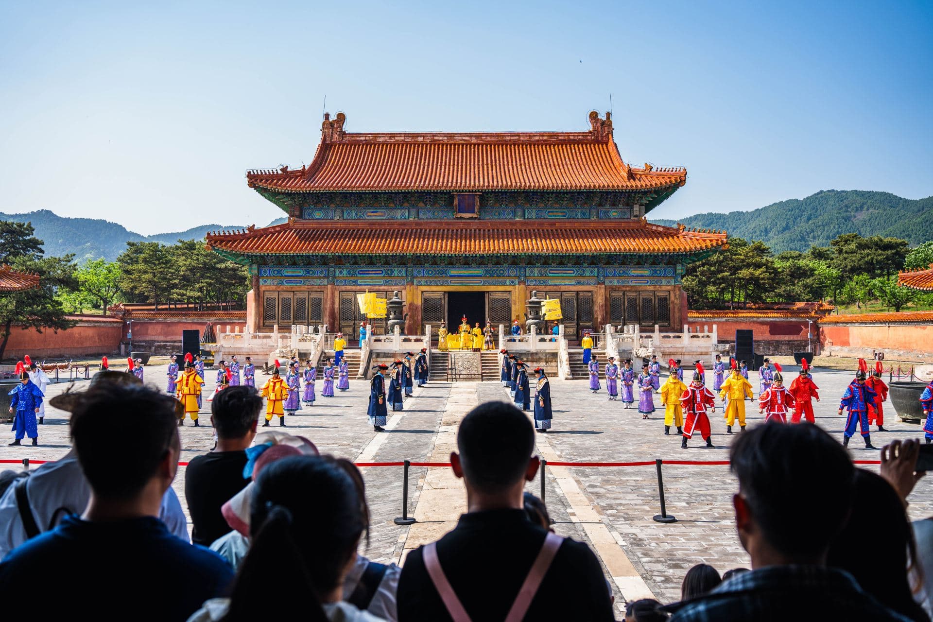A ceremony outside a yellow-roofed pavilion at the Eastern Qing Tombs