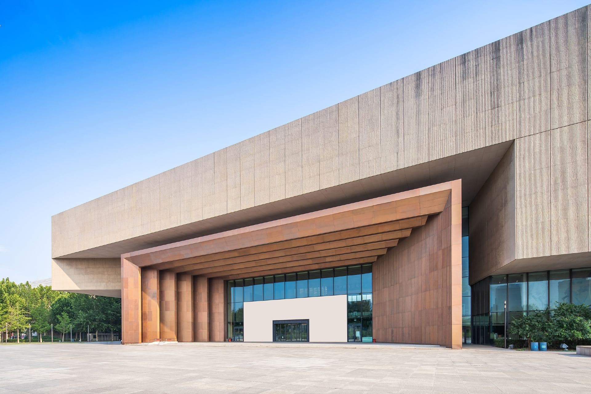 Tianjin Museum’s main facade with a layered entrance portal and the plaza in front.