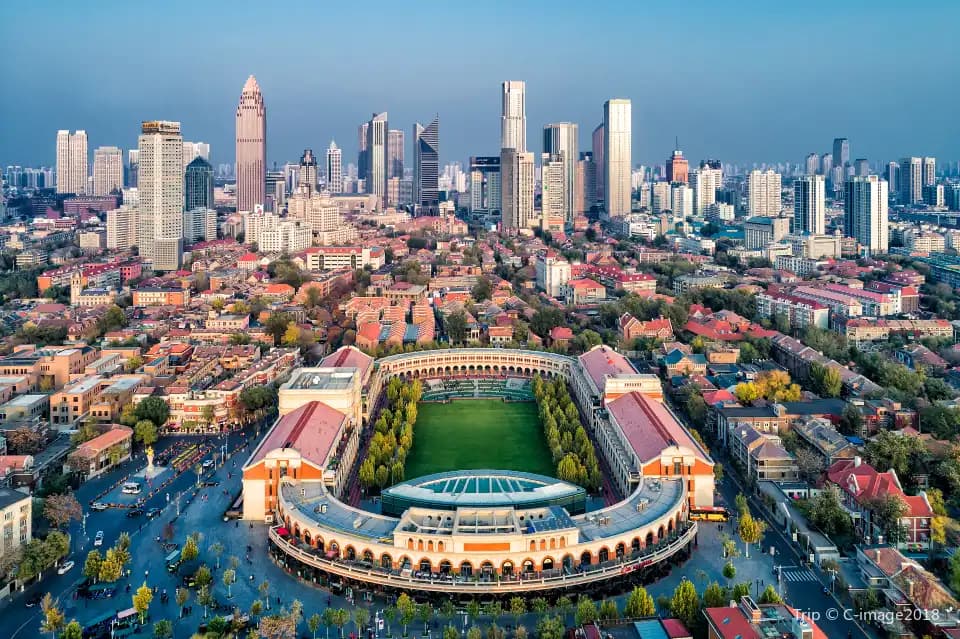 Aerial view of Wudadao with Minyuan Square, red-roofed villas and Tianjin’s skyline